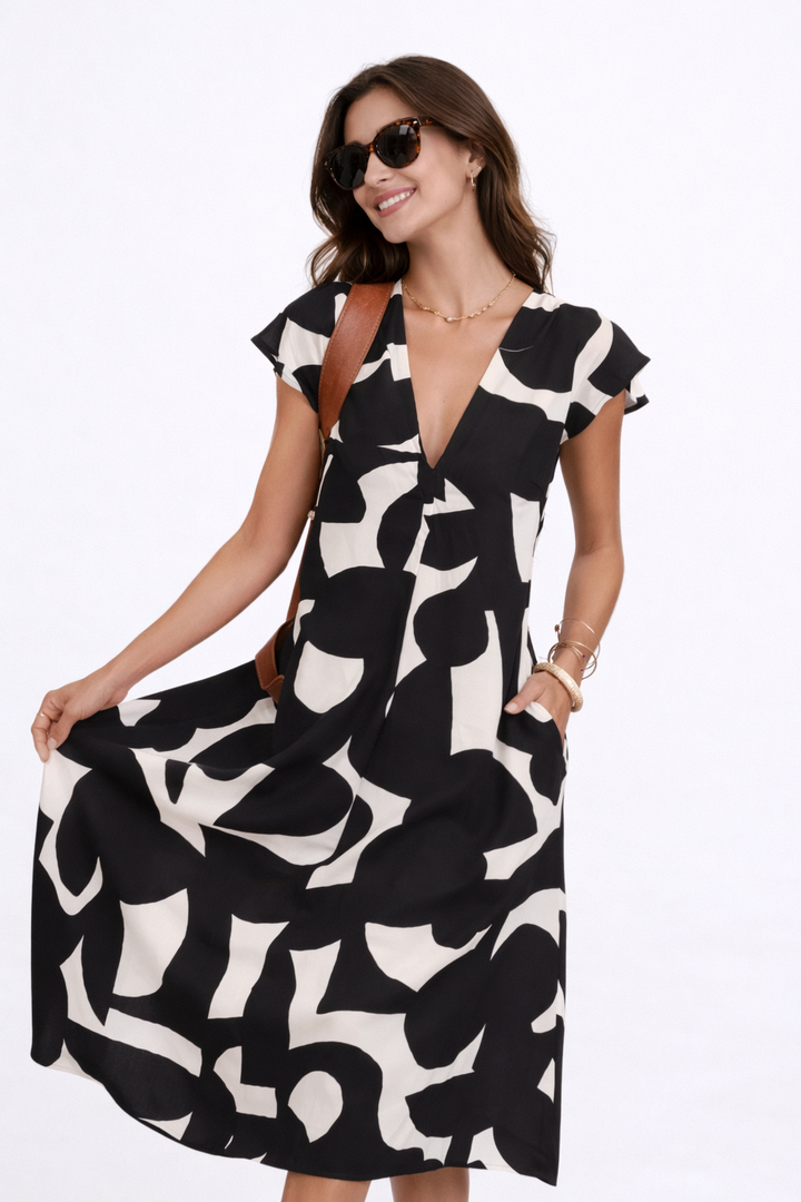 Camelia | Flowing Midi Dress with Bold Print